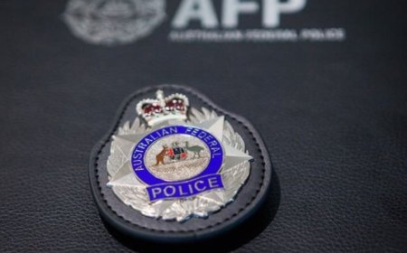 Two Australians Arrested Over Alleged Online Threats to Federal Parliamentarians